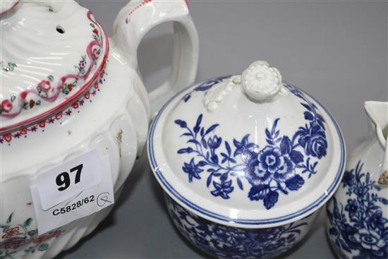 A Worcester blue and white coffee pot and cover, sugar bowl and cover and milk jug, c.1760-75 and a New Hall type teapot and cover c. 1